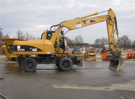Колёсный экскаватор Caterpillar M318C купить в компании Рабочие Машины