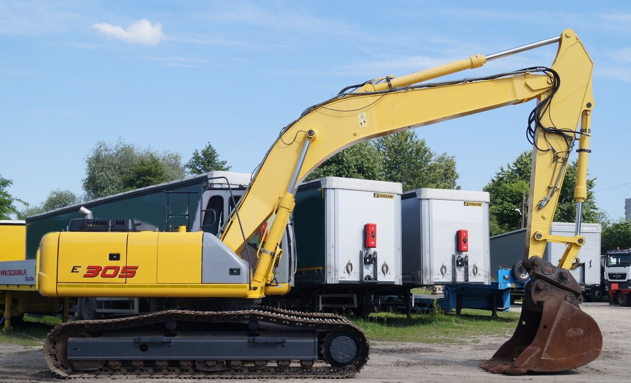 Гусеничный экскаватор NEW HOLLAND  E305 купить в компании Рабочие Машины