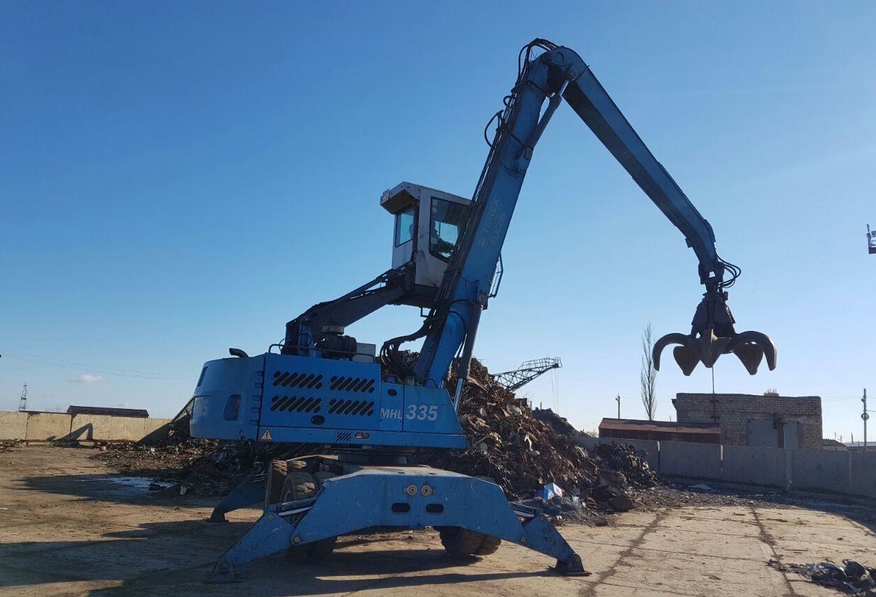 ПерегружательTEREX - FUCHS MHL335 купить в компании Рабочие Машины