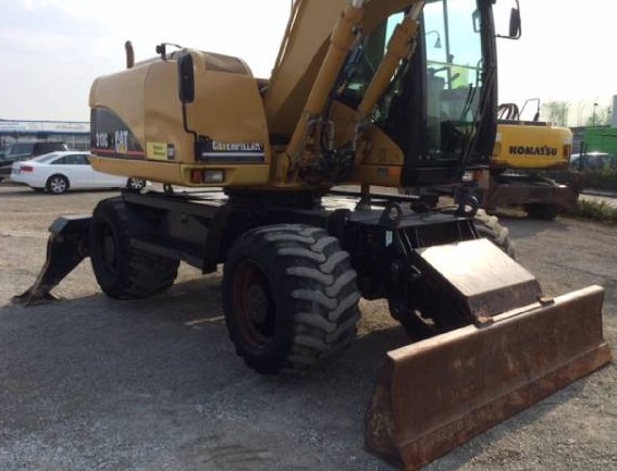 Колесный экскаватор Caterpillar M313C купить в компании Рабочие Машины