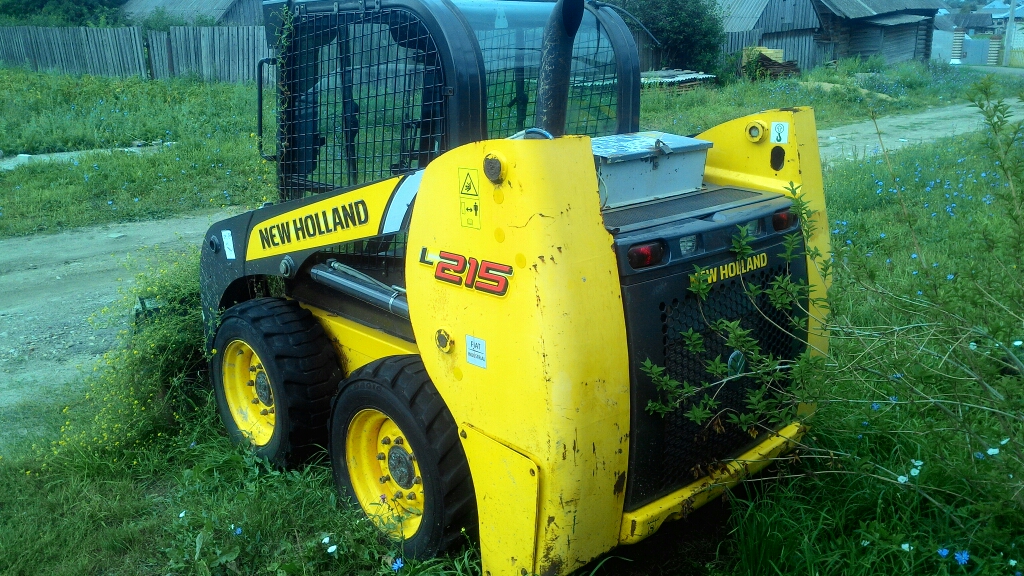 Мини - погрузчик фронтальный NEW HOLLAND L215 купить в компании Рабочие Машины