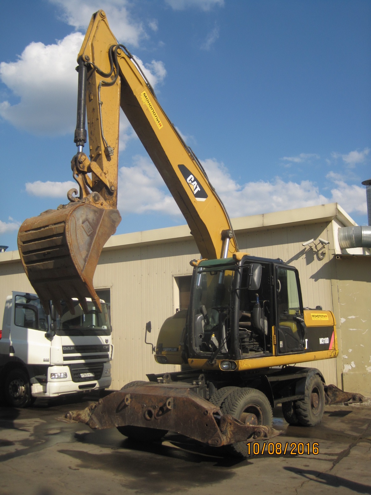 Колесный экскаватор CATERPILLAR M318D купить в компании Рабочие Машины