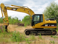 Экскаватор гусеничный Caterpillar 319C купить в компании Рабочие Машины