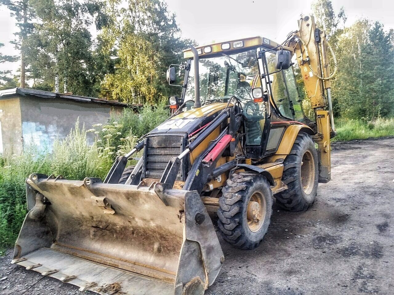 Экскаватор - погрузчик CATERPILLAR 432D купить в компании Рабочие Машины