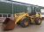Фронтальный погрузчик Caterpillar 938G II купить в компании Рабочие Машины