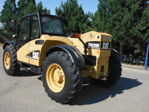 Телескопический погрузчик Caterpillar TH330B купить в компании Рабочие Машины
