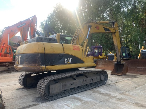 Гусеничный экскаватор CAT 318 купить в компании Рабочие Машины
