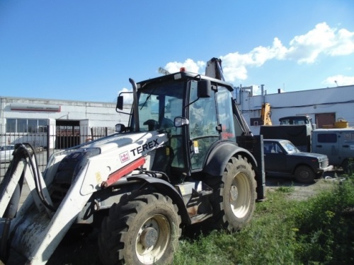 Экскаватор - погрузчик TEREX 860SX купить в компании Рабочие Машины