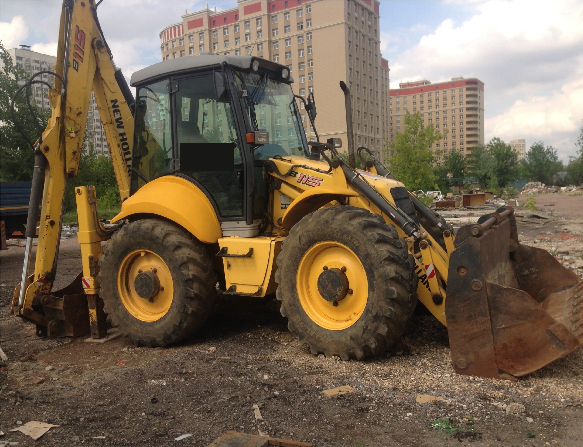 Экскаватор - погрузчик NEW HOLLAND B115 купить в компании Рабочие Машины