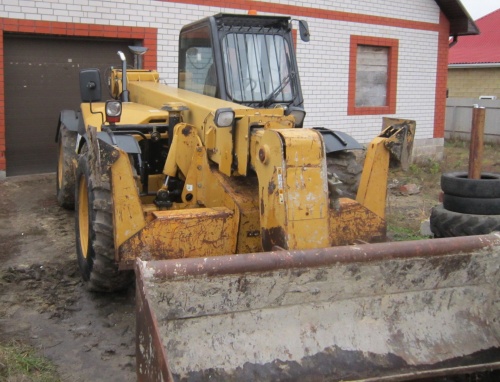 Телескопический погрузчик CATERPILLAR ТН 63 купить в компании Рабочие Машины
