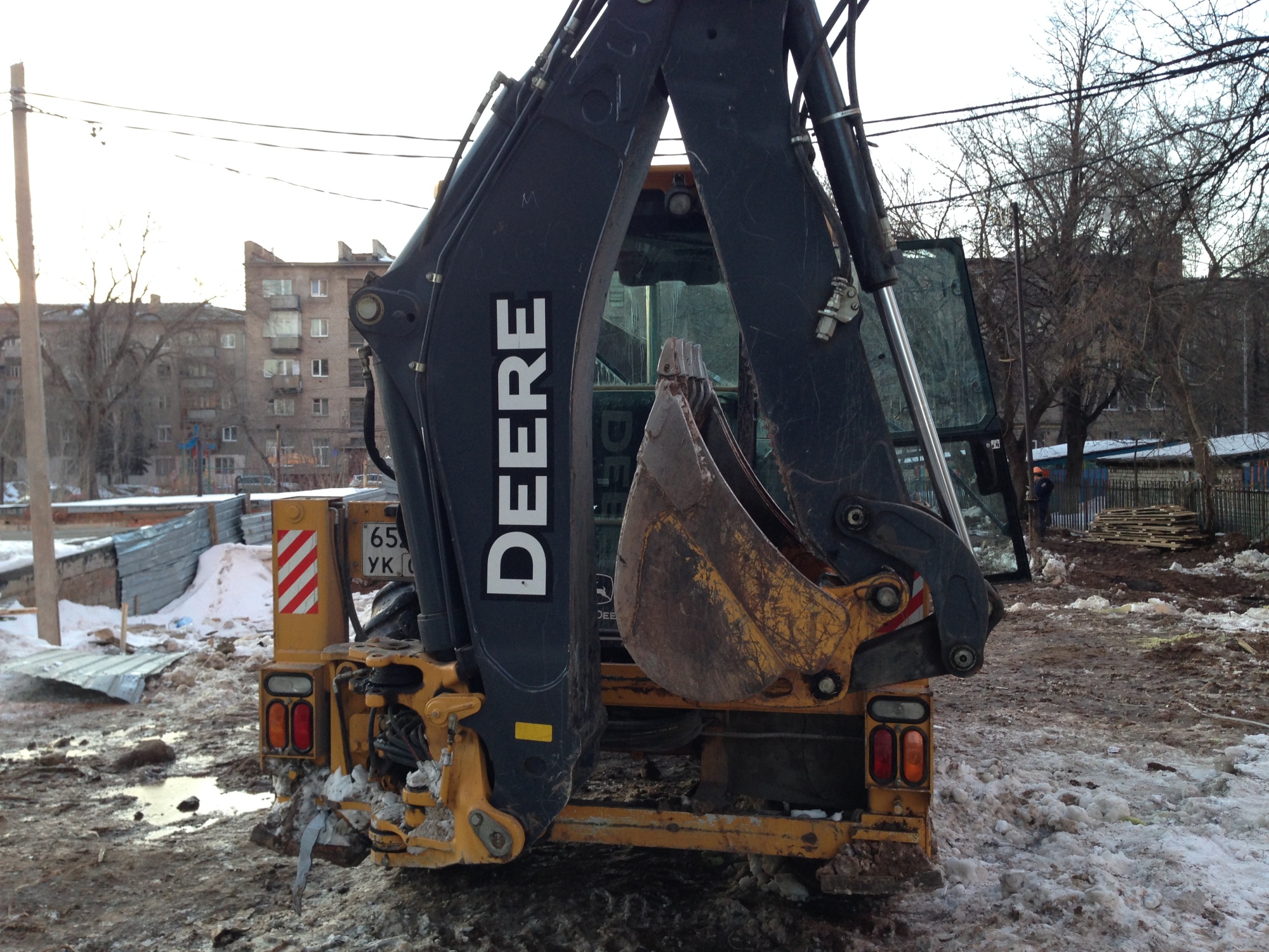 экскаватор-погрузчик John Deere 325K купить в компании Рабочие Машины