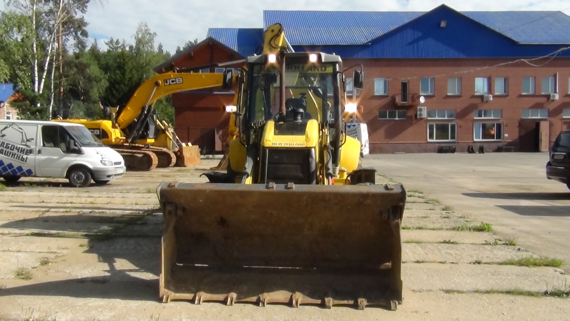 Экскаватор-погрузчик NEW HOLLAND B100B купить в компании Рабочие Машины