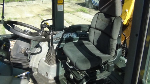 Экскаватор-погрузчик NEW HOLLAND B100B купить в компании Рабочие Машины
