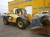 Телескопический погрузчик Caterpillar TH407 купить в компании Рабочие Машины