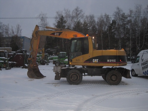 Колесный экскаватор CATERPILLAR M315C купить в компании Рабочие Машины