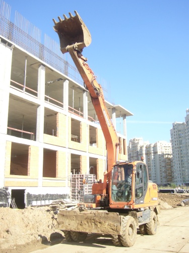 экскаватор колесный DOOSAN 140 W купить в компании Рабочие Машины