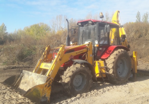 Экскаватор - погрузчик АМКОДОР 702EМ купить в компании Рабочие Машины