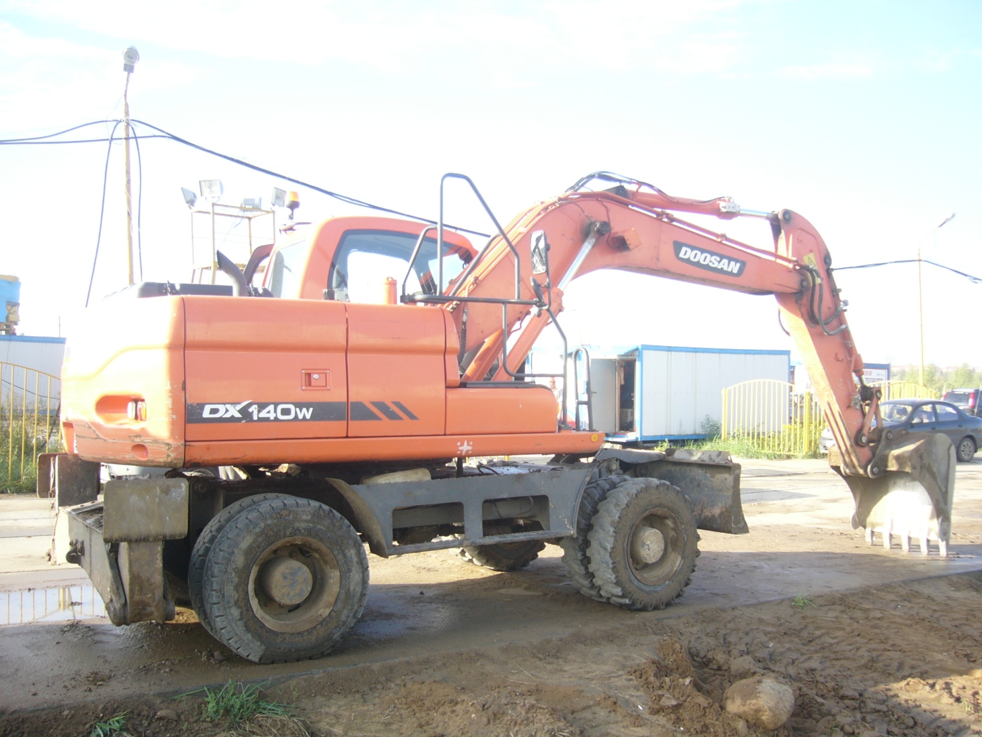 экскаватор колесный DOOSAN 140 W купить в компании Рабочие Машины
