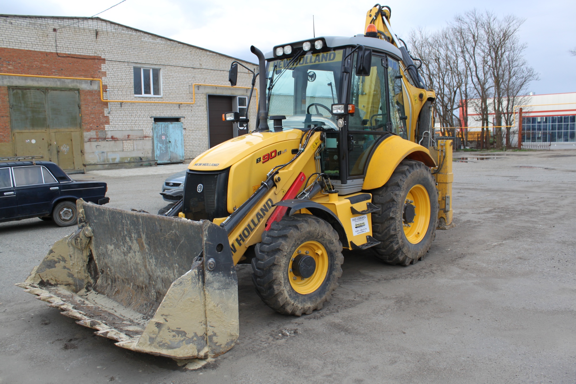 экскаватор-погрузчик  New Holland B90B купить в компании Рабочие Машины
