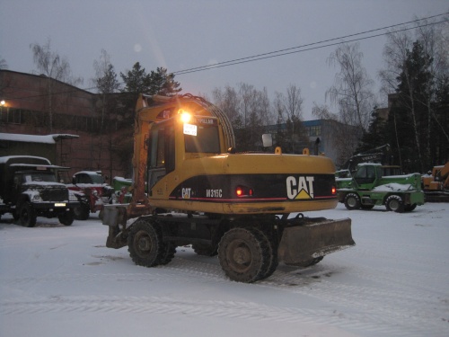 Колесный экскаватор CATERPILLAR M315C купить в компании Рабочие Машины