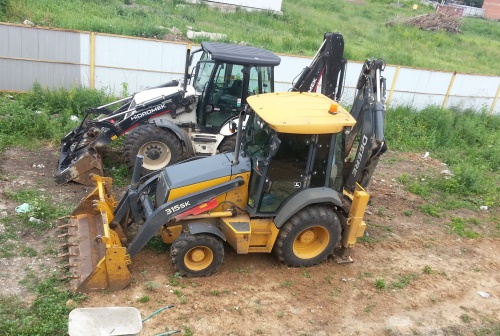 Экскаватор - погрузчик JOHN DEERE 315SK купить в компании Рабочие Машины