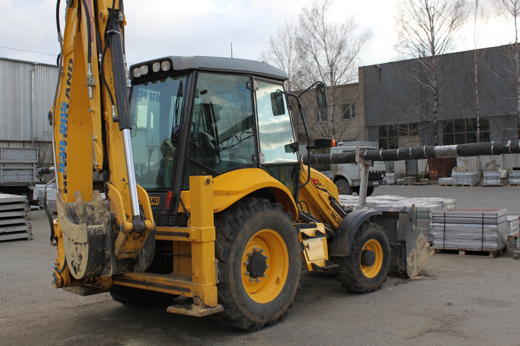 экскаватор-погрузчик  New Holland B90B купить в компании Рабочие Машины