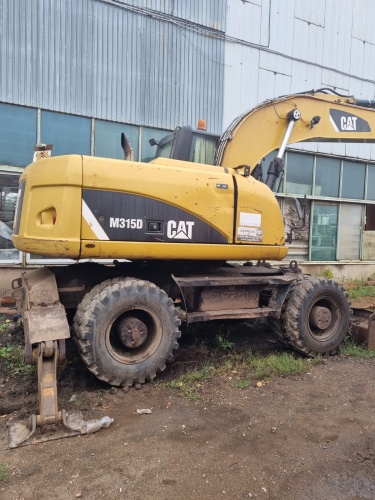 Экскаватор колесный CAT M315D купить в компании Рабочие Машины