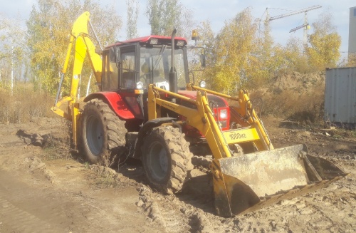 Экскаватор - погрузчик АМКОДОР 702EМ купить в компании Рабочие Машины