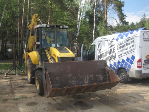 Экскаватор-погрузчик New Holland B100B купить в компании Рабочие Машины