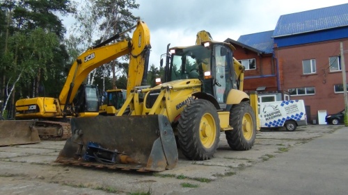 Экскаватор - погрузчик KOMATSU WB93S-5 купить в компании Рабочие Машины