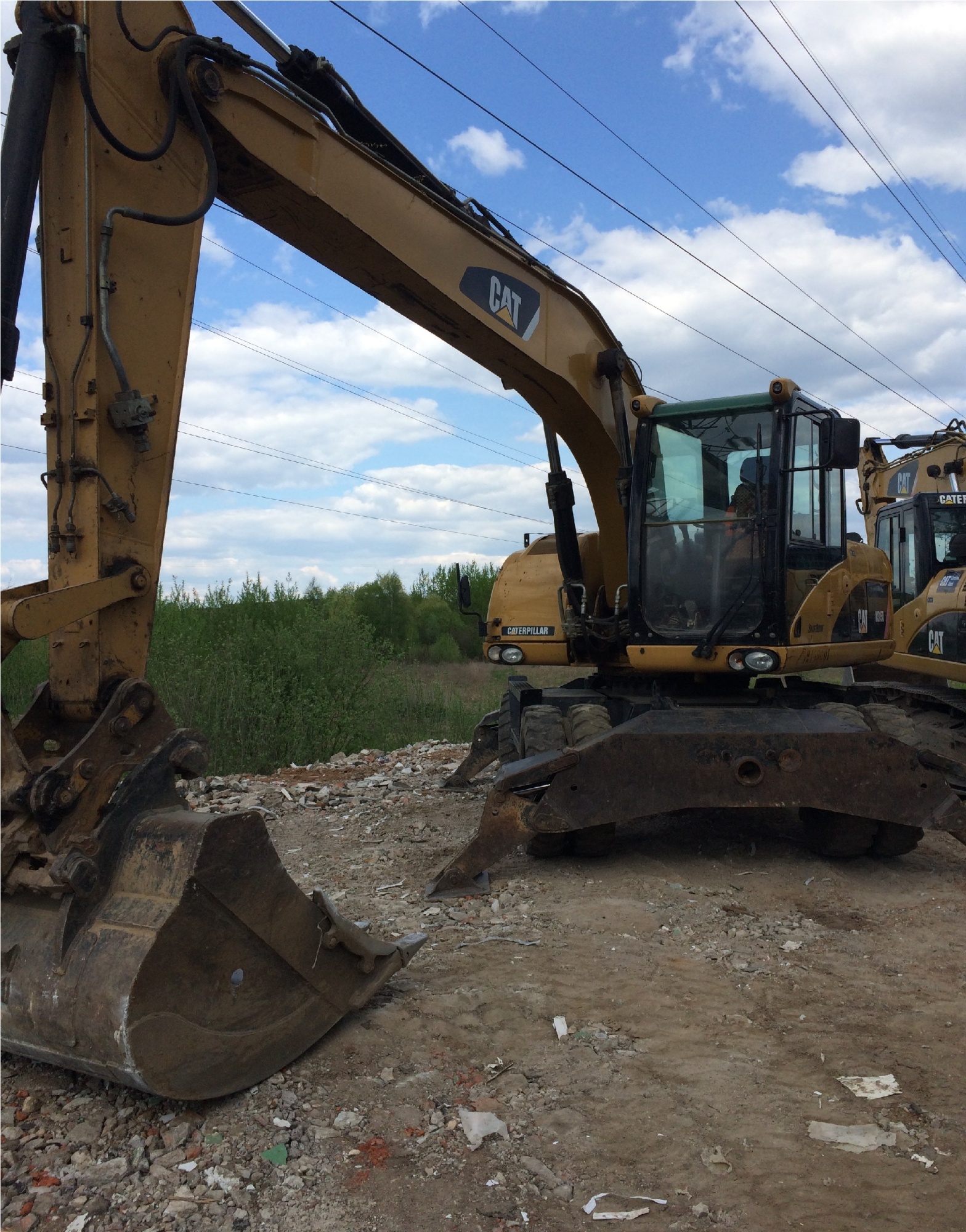 Колесный экскаватор CATERPILLAR M315D купить в компании Рабочие Машины