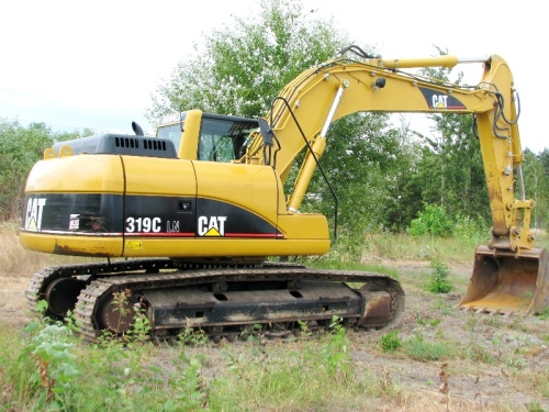 Экскаватор гусеничный Caterpillar 319C купить в компании Рабочие Машины