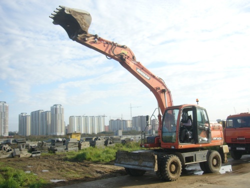 экскаватор колесный DOOSAN 140 W купить в компании Рабочие Машины