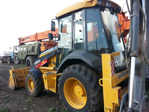Экскаватор - погрузчик JOHN DEERE 315SK купить в компании Рабочие Машины