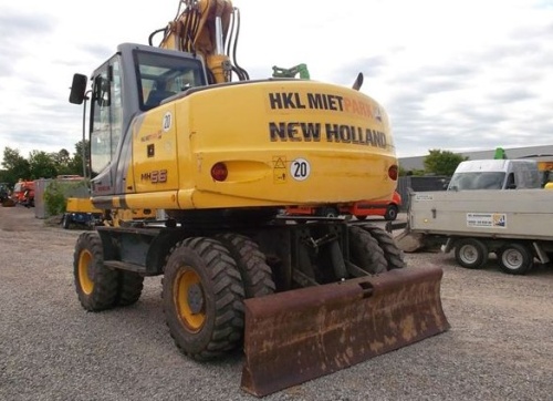Колёсный экскаватор New Holland MH 5.6 купить в компании Рабочие Машины