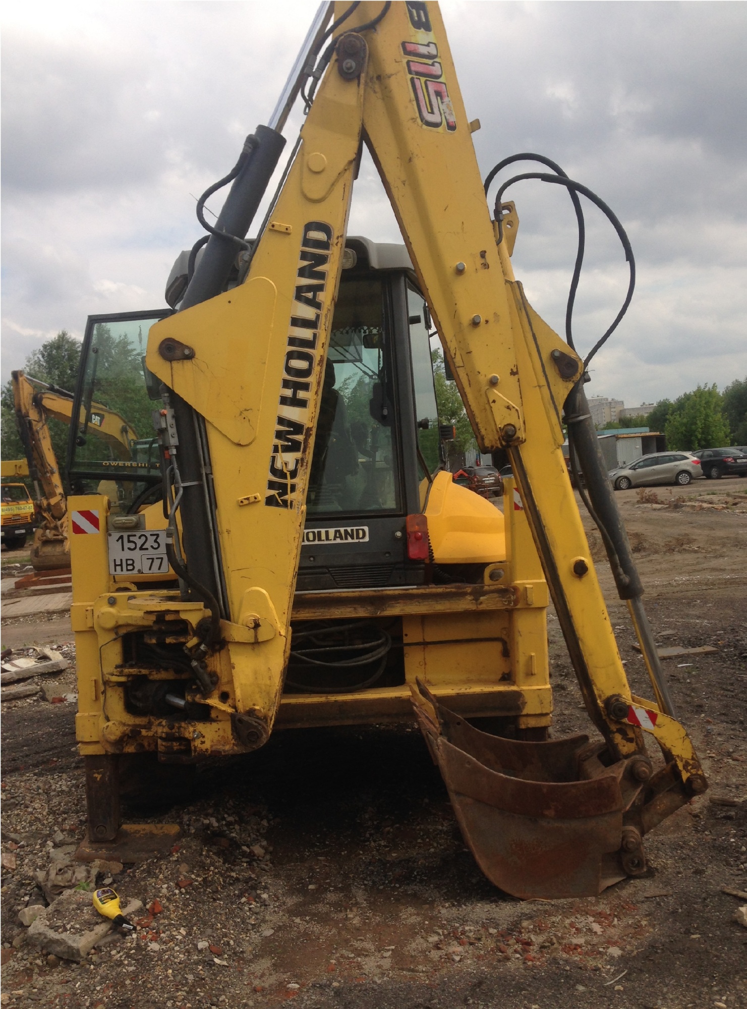 Экскаватор - погрузчик NEW HOLLAND B115 купить в компании Рабочие Машины