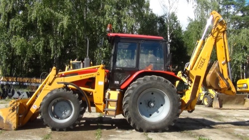 Экскаватор - погрузчик АМКОДОР 702EA купить в компании Рабочие Машины