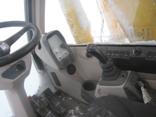 Колесный экскаватор New Holland MH 4.6 купить в компании Рабочие Машины