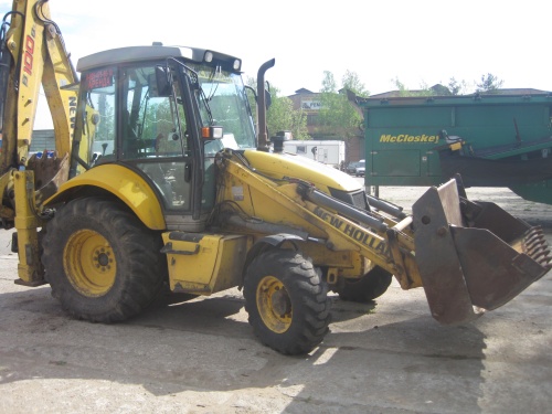 Экскаватор-погрузчик New Holland B100B купить в компании Рабочие Машины