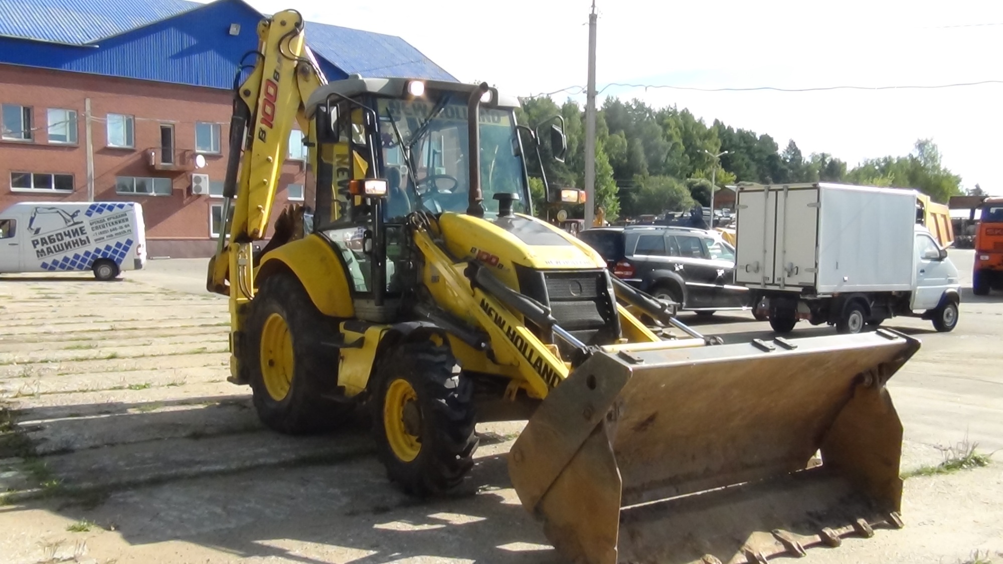 Экскаватор-погрузчик NEW HOLLAND B100B купить в компании Рабочие Машины
