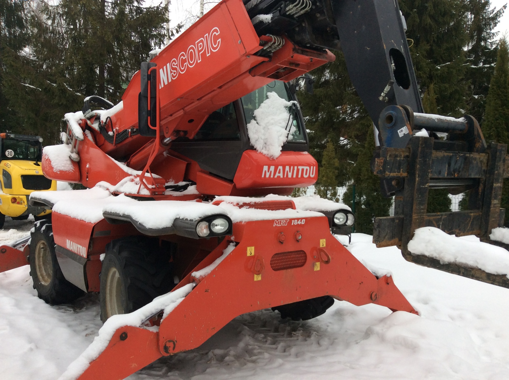 Телескопический погрузчик Manitou MRT 1840 купить в компании Рабочие Машины