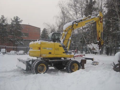 Колесный экскаватор New Holland MH 4.6 купить в компании Рабочие Машины