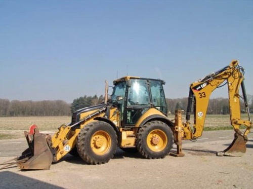 Экскаватор-погрузчик Caterpillar 444E купить в компании Рабочие Машины