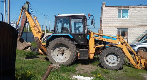 Экскаватор-погрузчик АМКОДОР 702 купить в компании Рабочие Машины