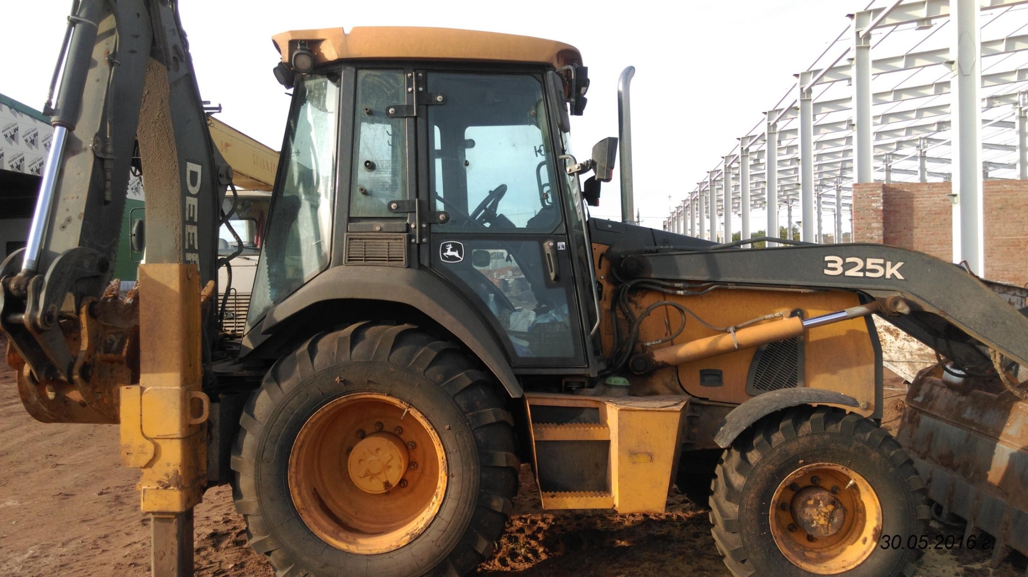 Экскаватор - погрузчик JOHN DEERE 325К купить в компании Рабочие Машины