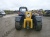 Телескопический погрузчик Caterpillar TH407 купить в компании Рабочие Машины