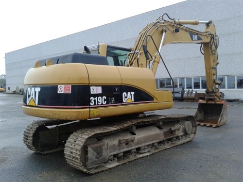 Экскаватор гусеничный Caterpillar 319CLN купить в компании Рабочие Машины