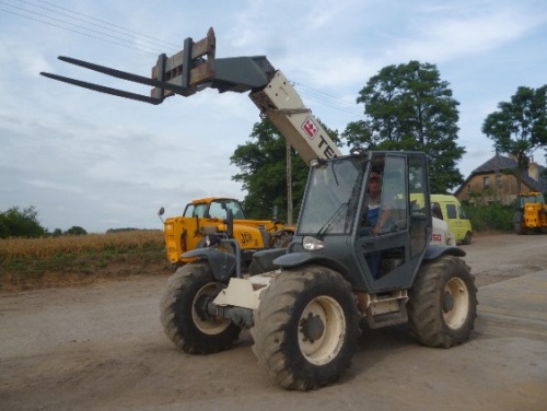 Телескопический погрузчик Terex T350 купить в компании Рабочие Машины