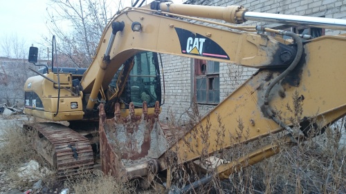 Экскаватор гусеничный Caterpillar 318 CL купить в компании Рабочие Машины