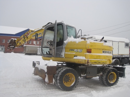 Колесный экскаватор New Holland MH 4.6 купить в компании Рабочие Машины